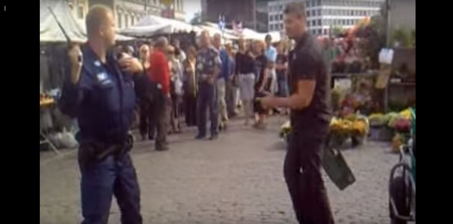 Кадр из видео драки с финской полицией в 2011 году.