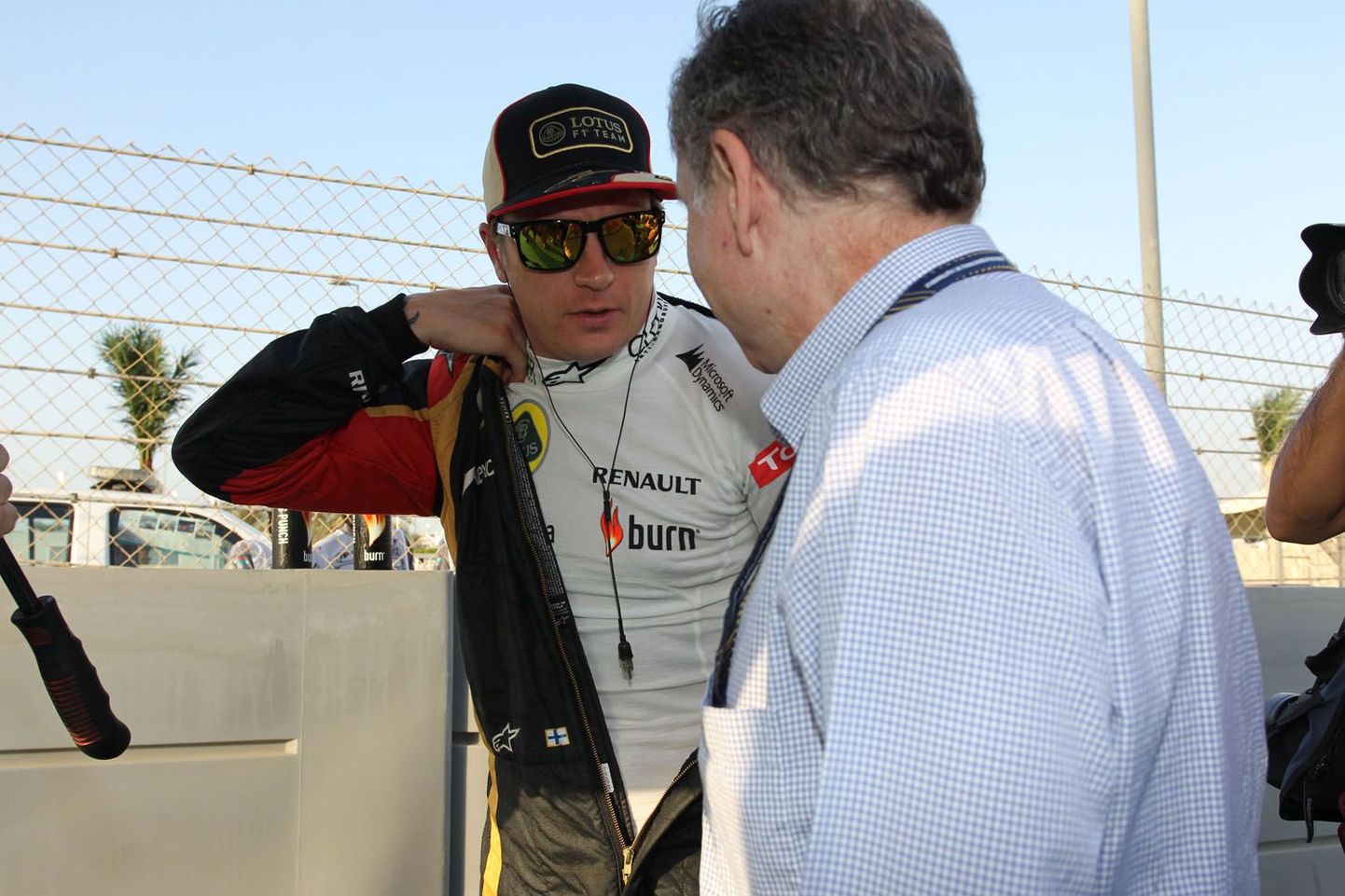 Kimi Räikkönen (vasakul).