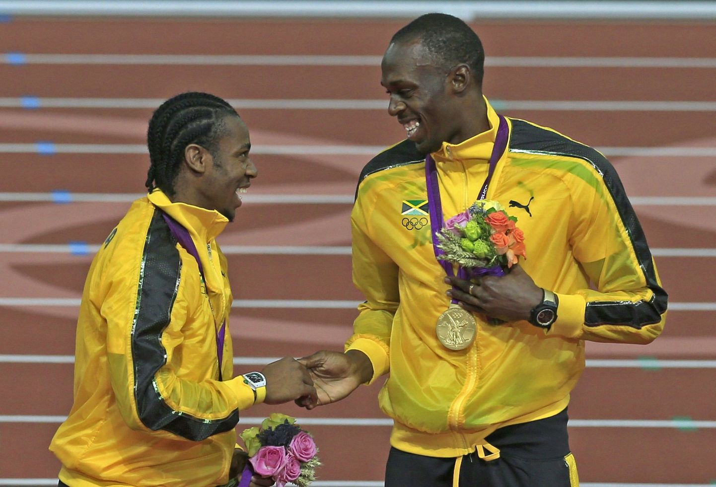 Yohan Blake (vasakul) ja Usain Bolt.