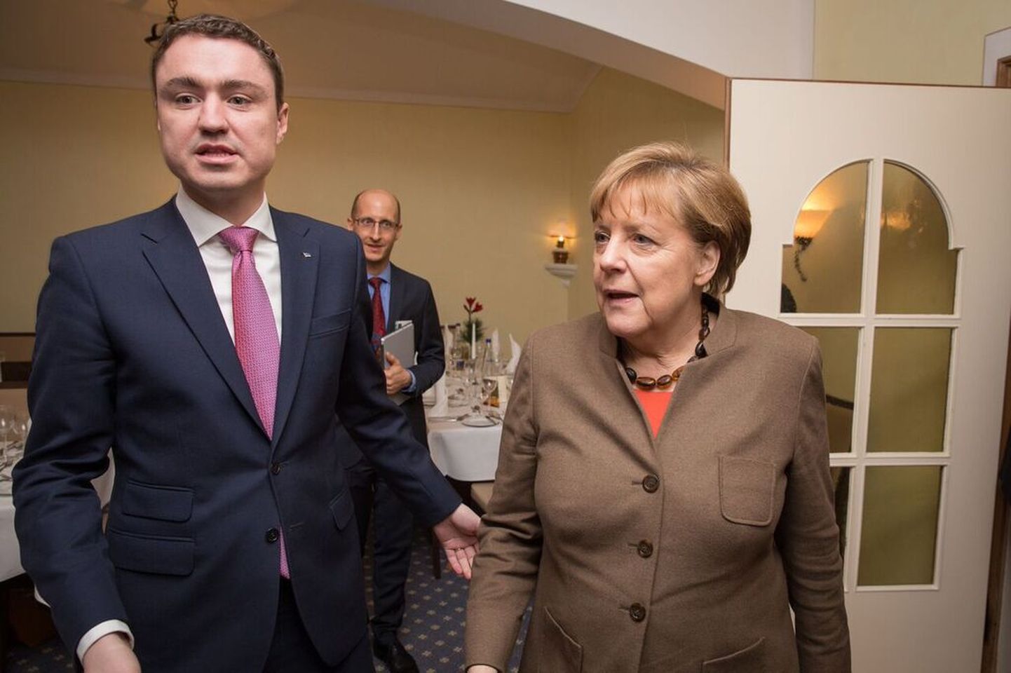 Таави Рыйвас на встрече с Ангелой Меркель.