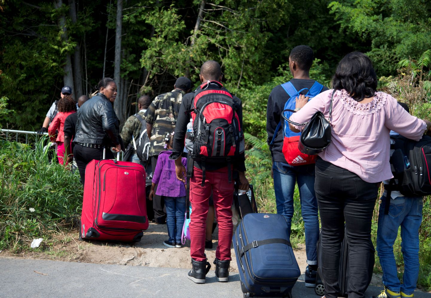 Migrandid Kanada piiril.