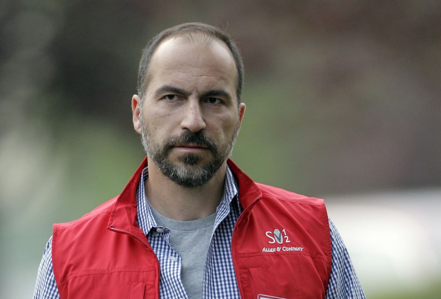 FILE- In this July 13, 2012, file photo, Dara Khosrowshahi the CEO of Expedia, Inc., attends the Allen & Company Sun Valley Conference in Sun Valley, Idaho. Two people briefed on the matter said Sunday, Aug. 27, 2017, that Khosrowshahi has been named CEO of ride-hailing giant Uber Technologies Inc. (AP Photo/Paul Sakuma, File)