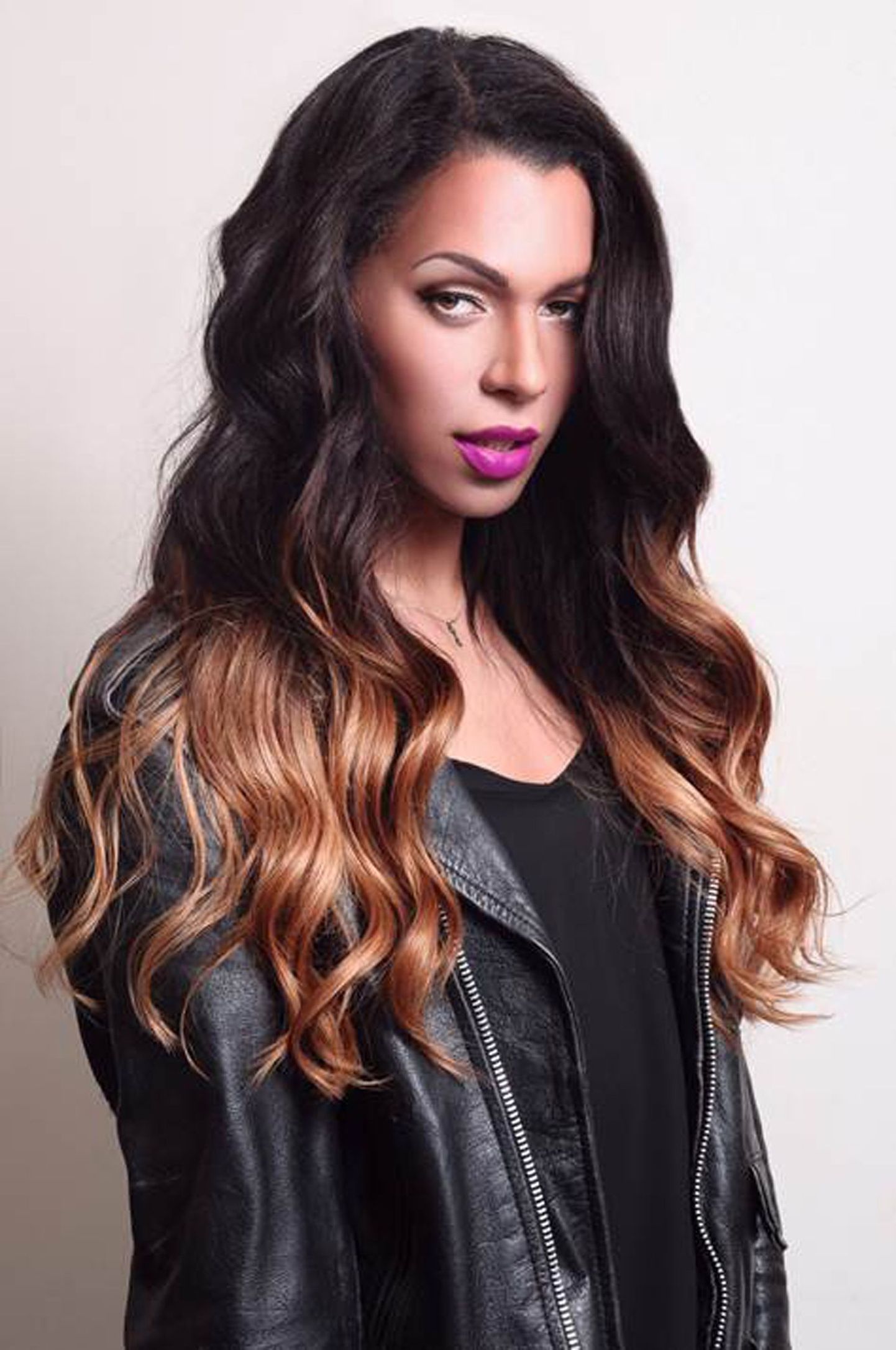 PIC BY LEFTERIS PRIMOS/CATERS - (PICTURED:MUNROE BERGDORF) - Meet Munroe Bergdorf, the super sexy brunette who was actually born a BOY. With her flowing locks and flawless complexion, its hard to believe that this 27-year-old from East London was once a boy named Ian. But transgender Munroe has made a name for herself on Londons party scene and now spins the decks in some of the countrys most high end clubs. The beautiful DJ has even worked with and modelled for a variety of fashion and beauty brands including Illamasqua and BOY LONDON - made famous by none other than global megastar Rihanna. SEE CATERS COPY.