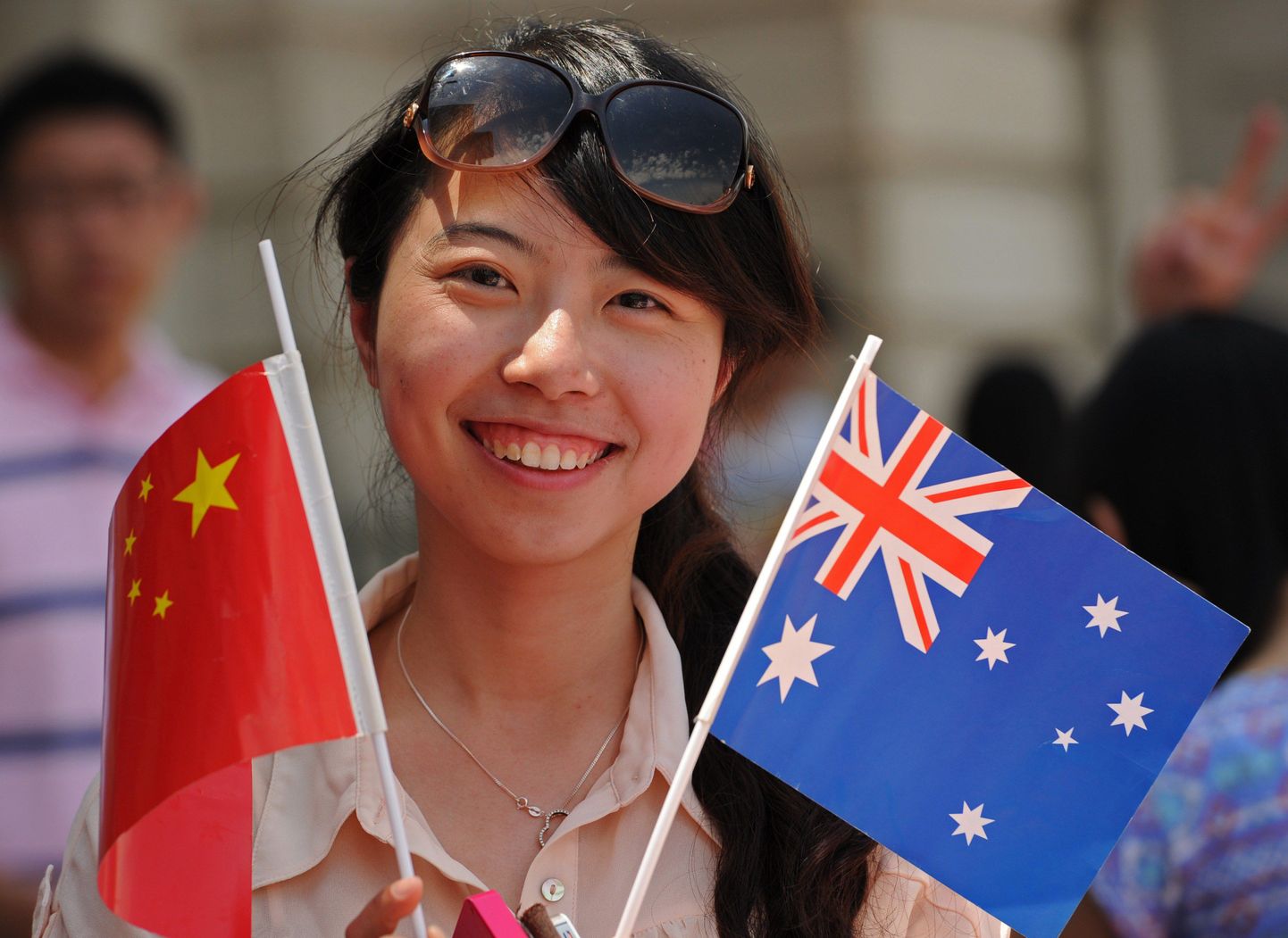 Hiinlanna, kes tuli Brisbane'i Hiina presidenti tervitama.