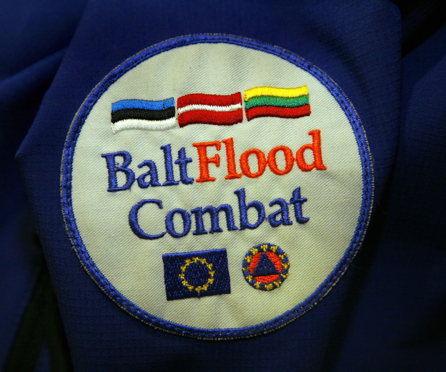 Balti päästemeeskonna BaltFloodCombat embleem.