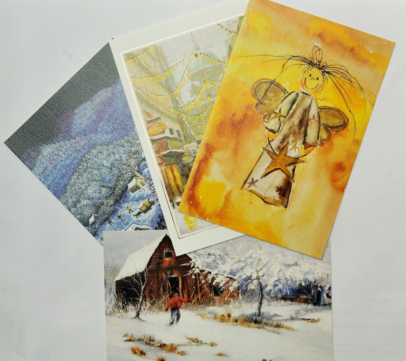 Jõulukaardid suu ja jalgade abil maalivatelt kunstnikelt 2010. aastal.