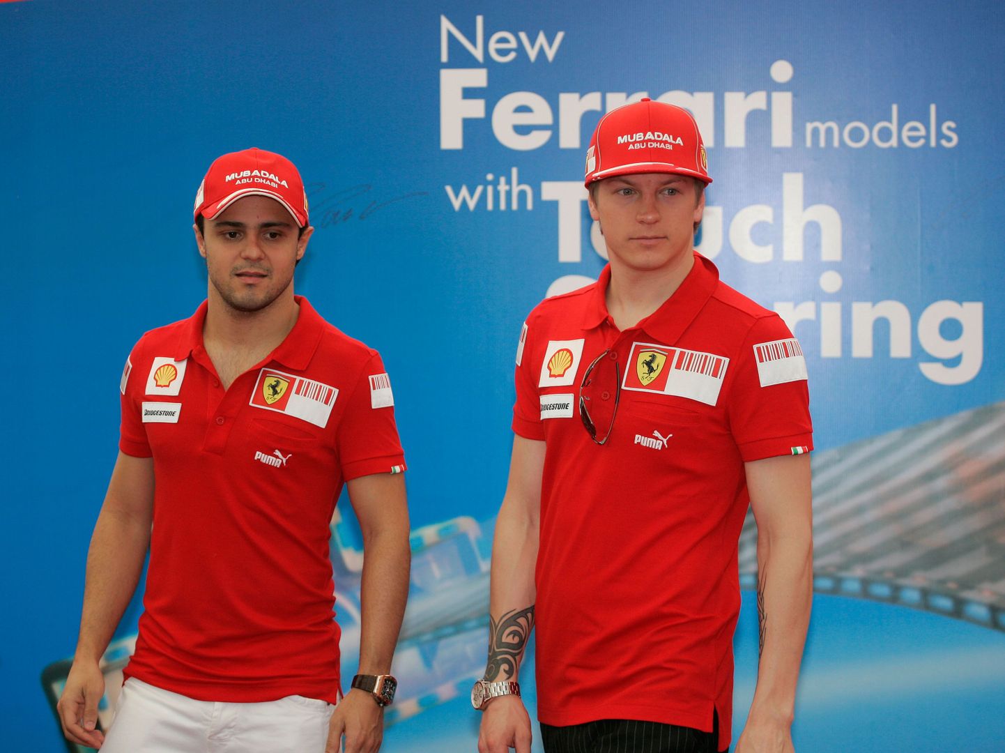 Felipe Massa (vasakul) ja Kimi Räikkönen 2009. aastal koos Ferraris.