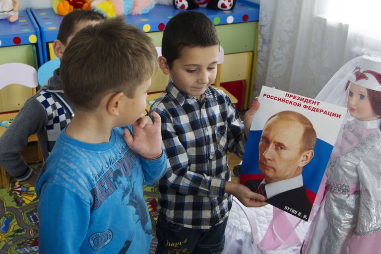 Venemaa president Vladimir Putin raamatu esikaanel. / Scanpix