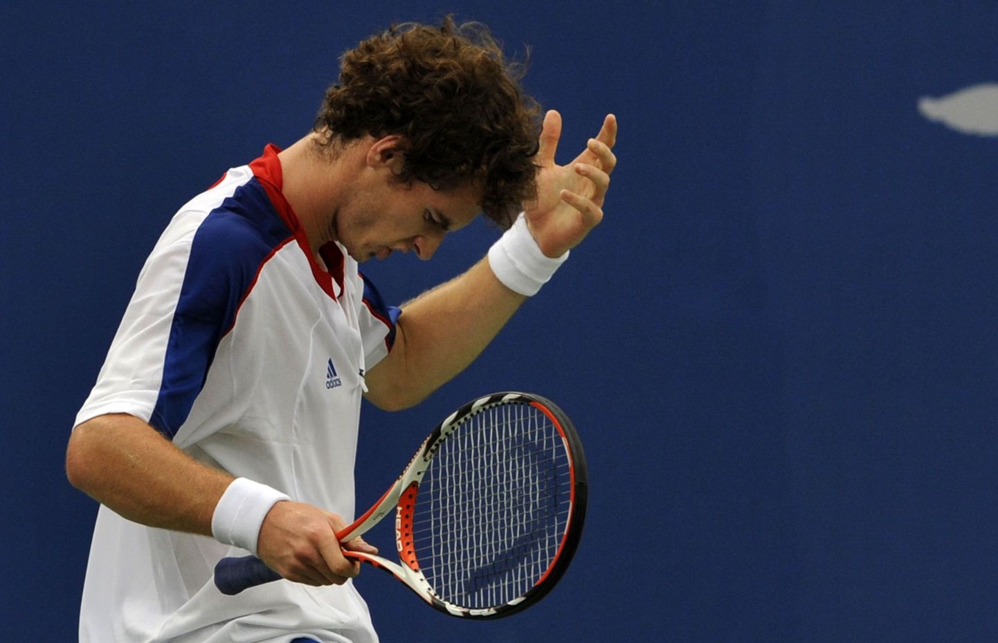 Andy Murray kaotas olümpiamängude avaringis.
