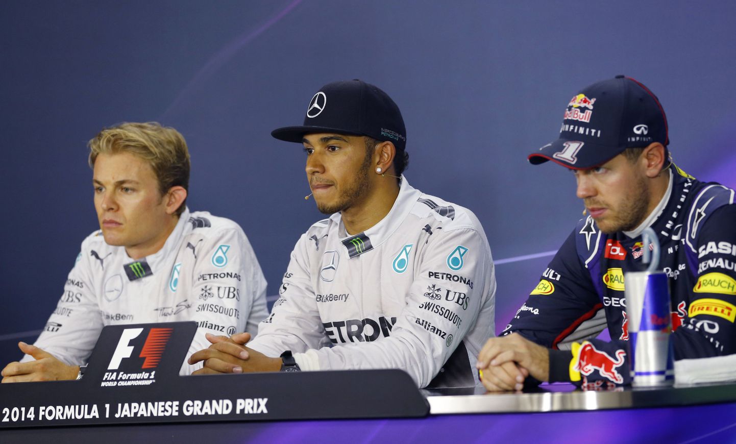 Nico Rosberg (vasakul), Lewis Hamilton (keskel) ja Sebastian Vettel.
