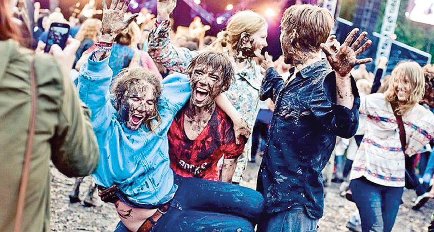 Tänavu juulis Lätis toimunud festivalil Positivus ei lasknud inimesed end külmast, märjast ja mudast häirida.
