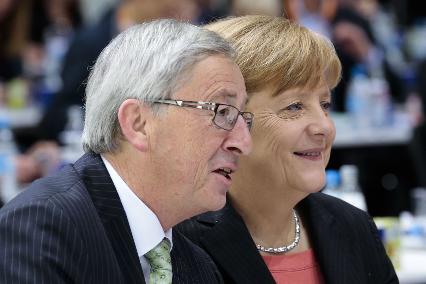 Jean-Claude Juncker ja Angela Merkel.