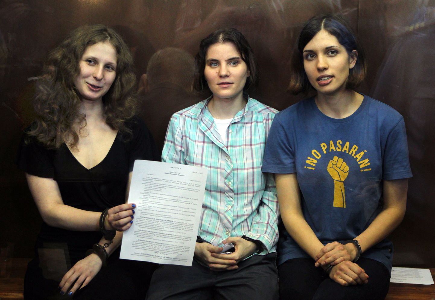 Punkbändi Pussy Riot liikmed (vasakult) Maria Aljohhina, Jekaterina Samutsevitš ja Nadežda Tolokonnikova.