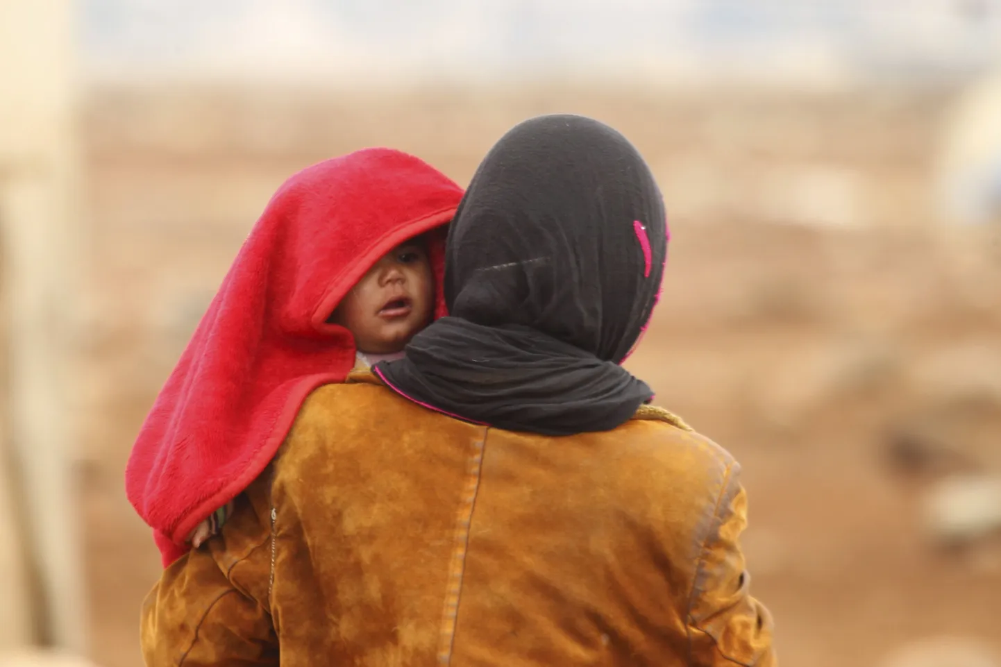Süüria naine lapsega.