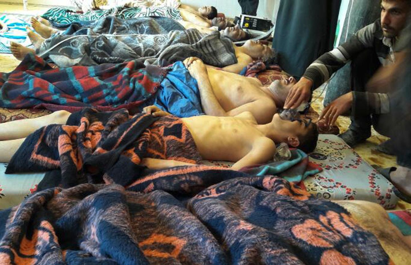 Пострадавшие в результате химатаки в Сирии.