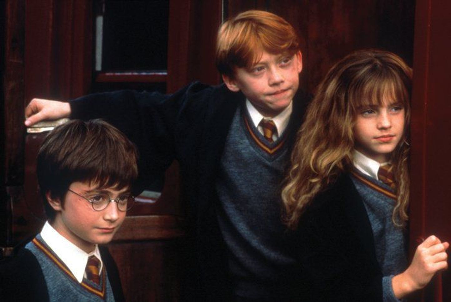 Harry, Ron ja Hermione filmis «Harry Potter ja tarkade kivi».