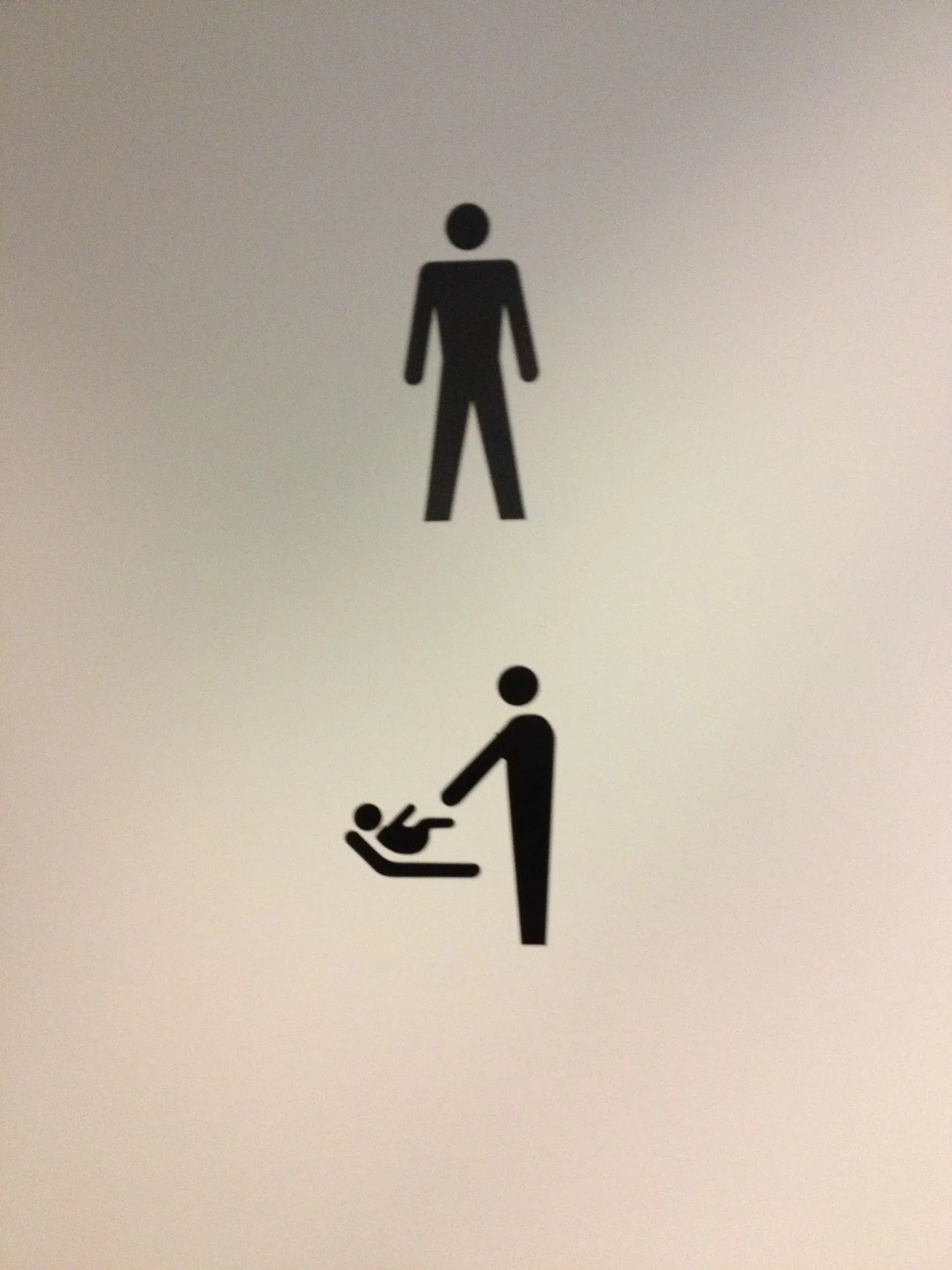 Mähkimisruumi tähis Kopenhaageni avalikus WC-s.