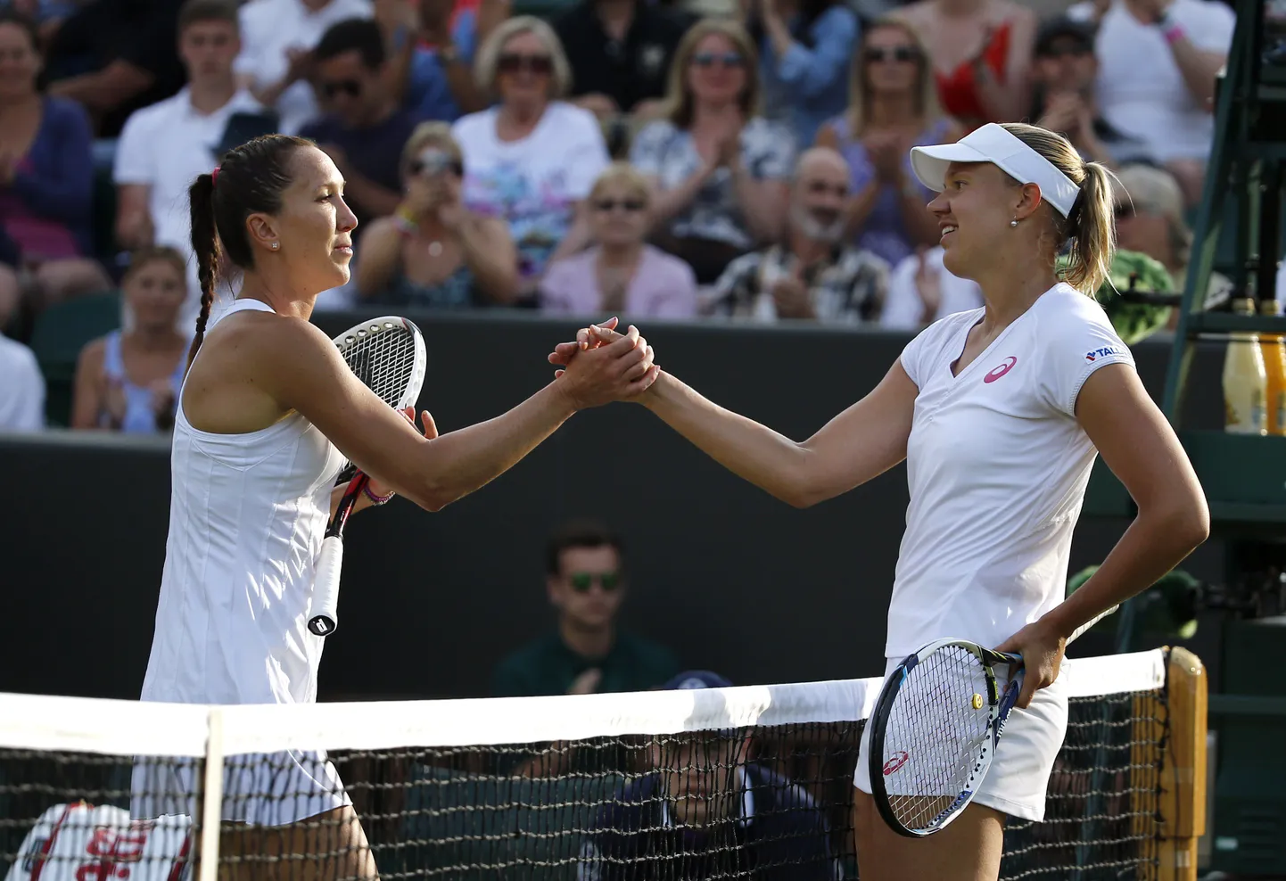 Kaia Kanepi (paremal) 2014. aastal Wimbledoni turniiril.