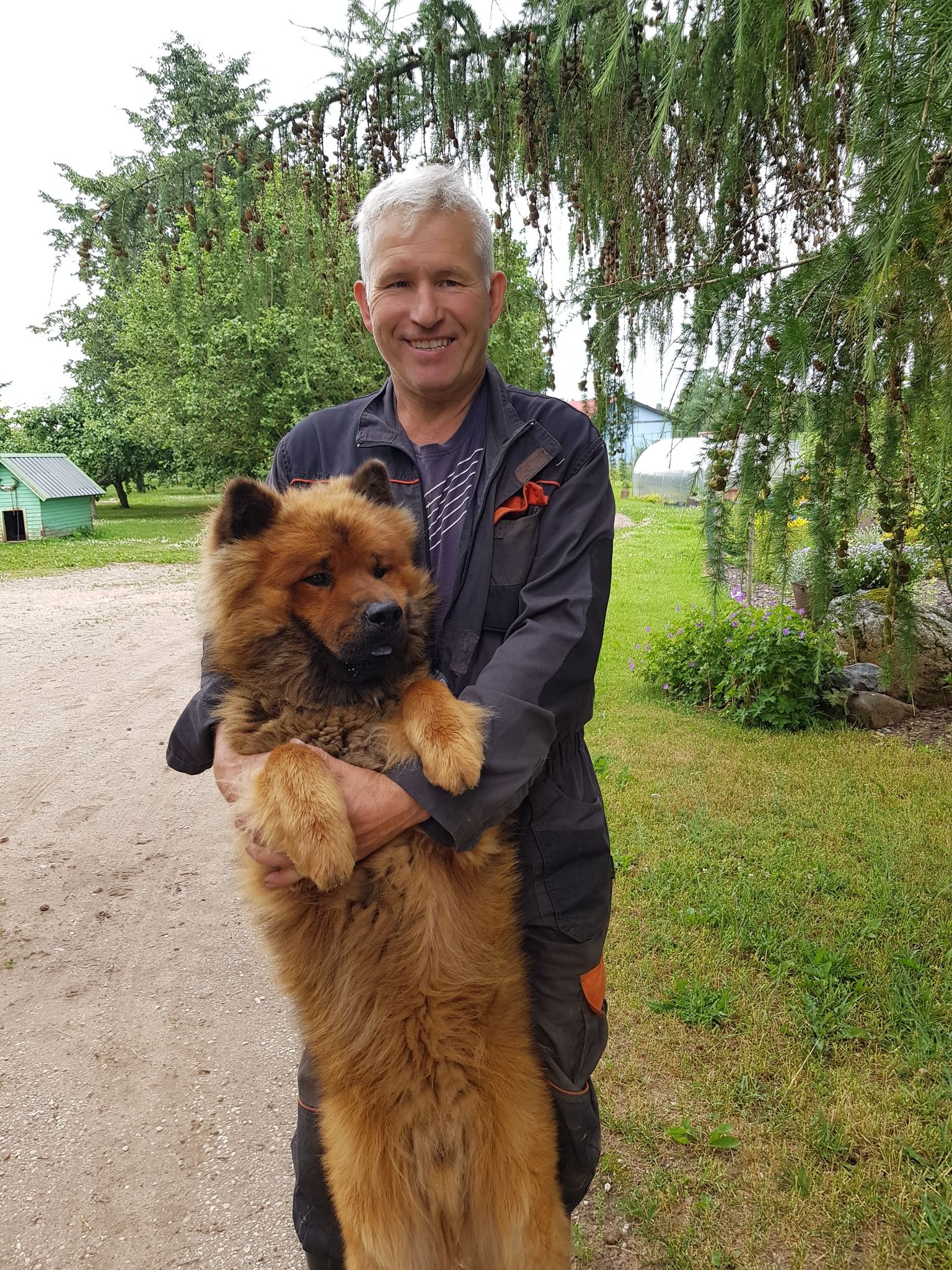 Peremees Meelis Tiigemäe ja koer Foxy