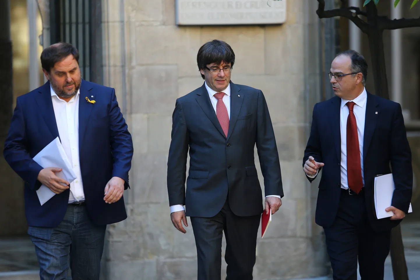 Oriol Junqueras, Carles Puigdemont ja Jordi Turull.