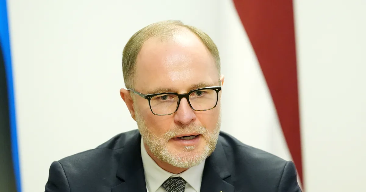 Latvian Defense Minister’s Resignation Shakes Government Ahead of Elections