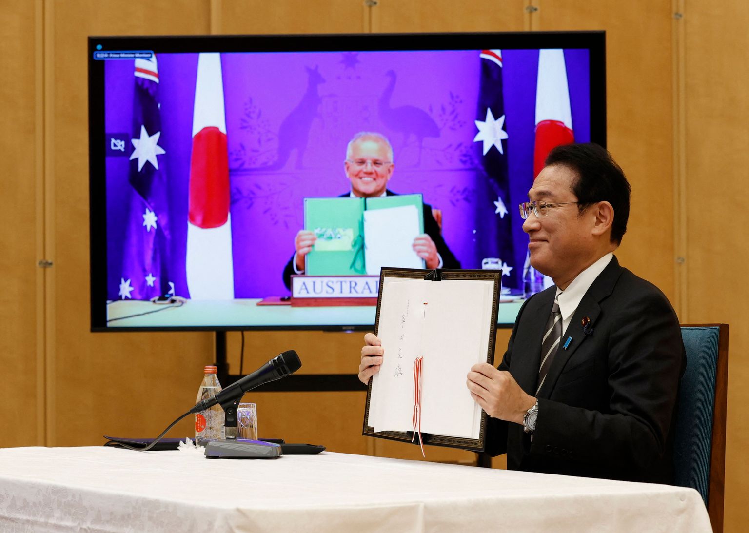 Jaapani peaminister Fumio Kishida (paremal) ja Austraalia peaminister Scott Morrison 6. jaanuar 2022.