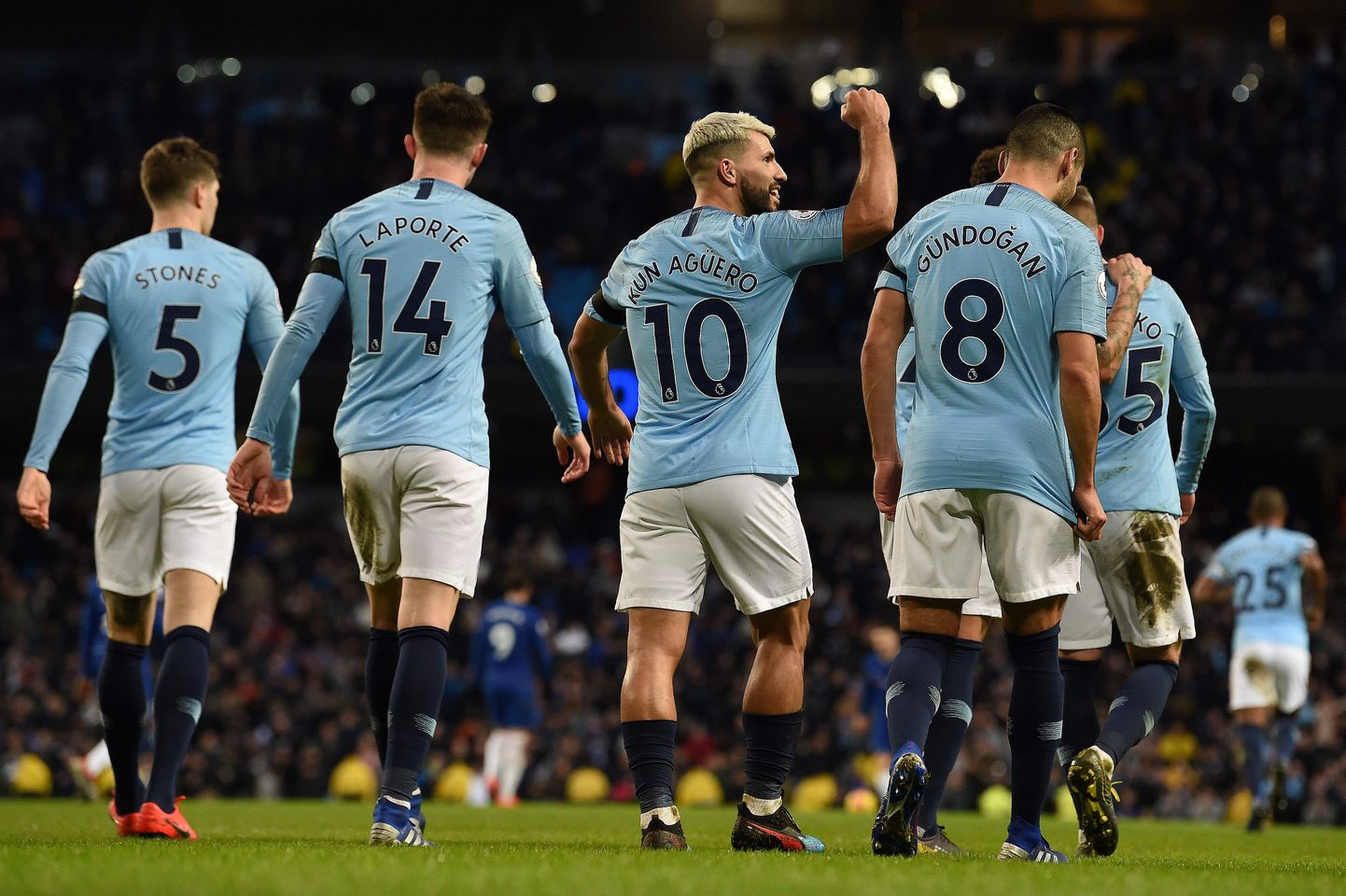 Manchester City's Argentinian striker Sergio Aguero celebrates scoring his team's fifth goal, his third, from the penalty spot during the English Premier League football match between Manchester City and Burnley at the Etihad Stadium in Manchester, north west England, on February 10, 2019. (Photo by Paul ELLIS / AFP) / RESTRICTED TO EDITORIAL USE. No use with unauthorized audio, video, data, fixture lists, club/league logos or 'live' services. Online in-match use limited to 120 images. An additional 40 images may be used in extra time. No video emulation. Social media in-match use limited to 120 images. An additional 40 images may be used in extra time. No use in betting publications, games or single club/league/player publications. /