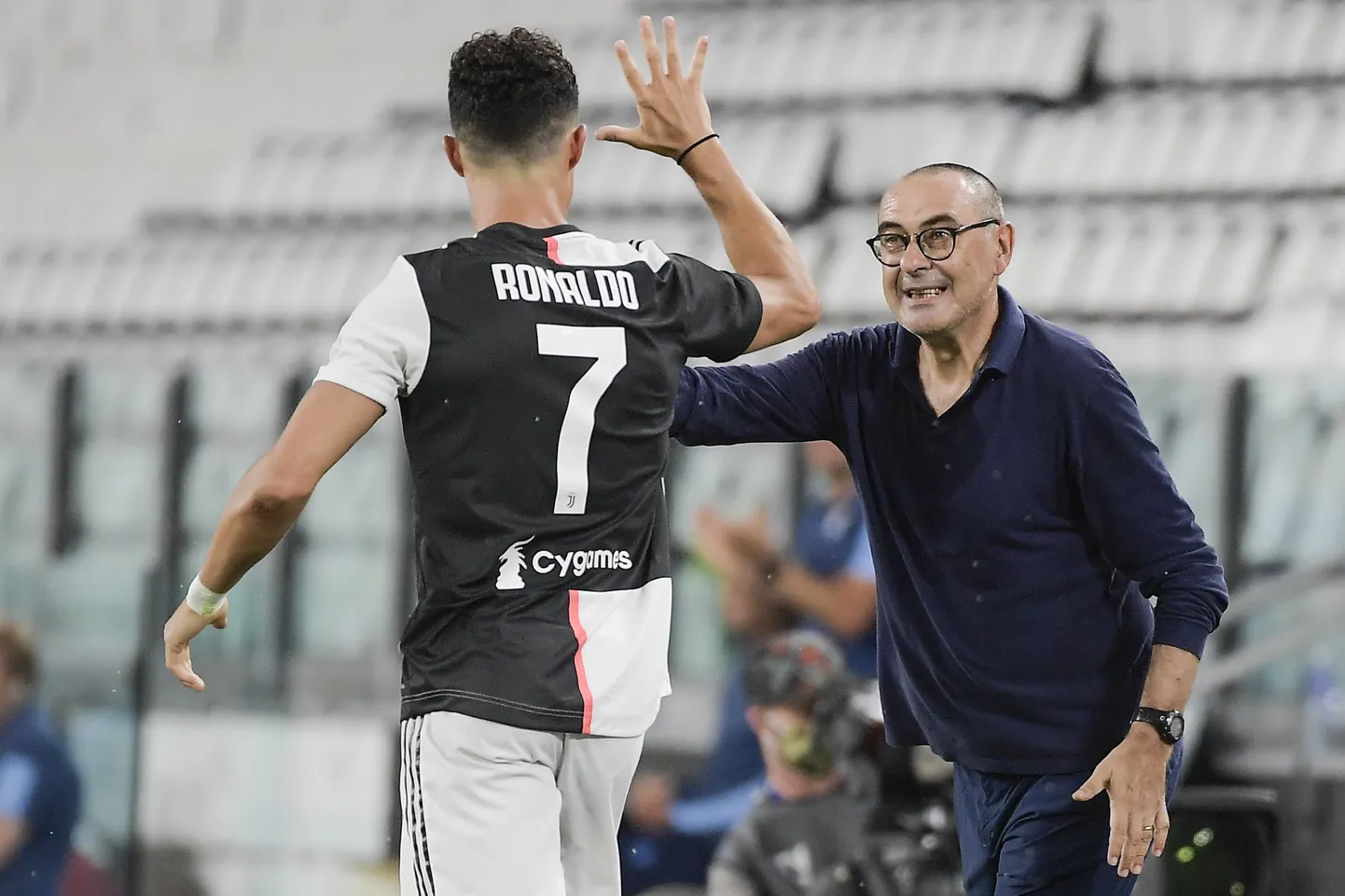 Cristiano Ronaldo ja Maurizio Sarri.