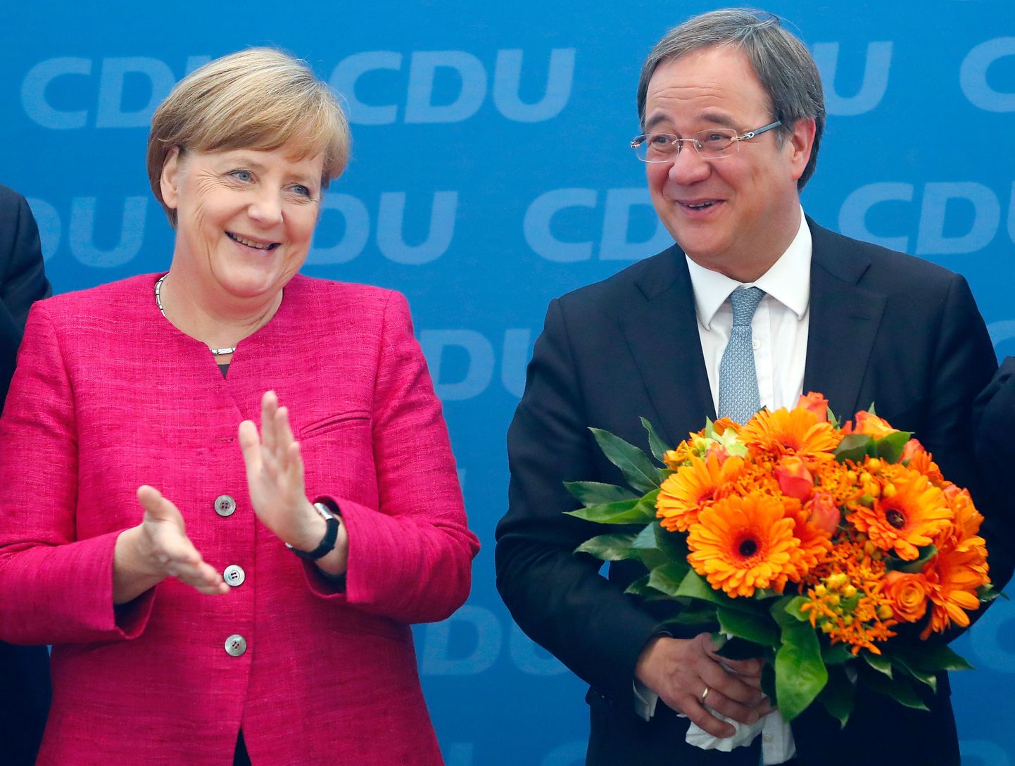 Kristlike demokraatide Nordrhein-Westfahleni liidumaa esinumber Armin Laschet ja Saksa liidukantsler Angela Merkel eile võidukalt Berliinis.