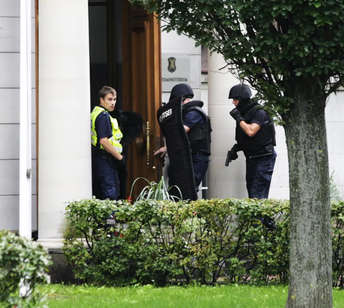 Estonian Police SWAT Team members entering the Ministry of Defense building in the afternoon of August 11, 2011. The shootout injured two policemen and ended fatally for the Russian influenced and heavily armed intruder Karen Drambjan.