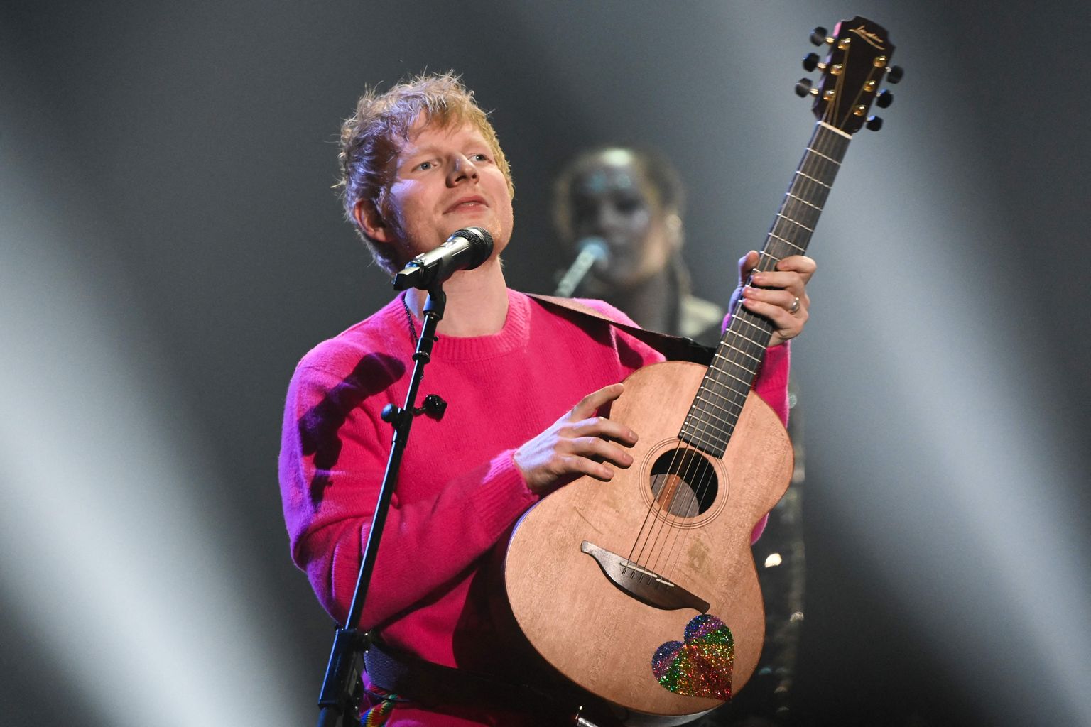 English singer-songwriter Ed Sheeran performs on stage during the MTV Europe Music Awards at the Laszlo Papp Budapest Sports Arena in Budapest, Hungary on November 14, 2021. (Photo by Attila KISBENEDEK / AFP)