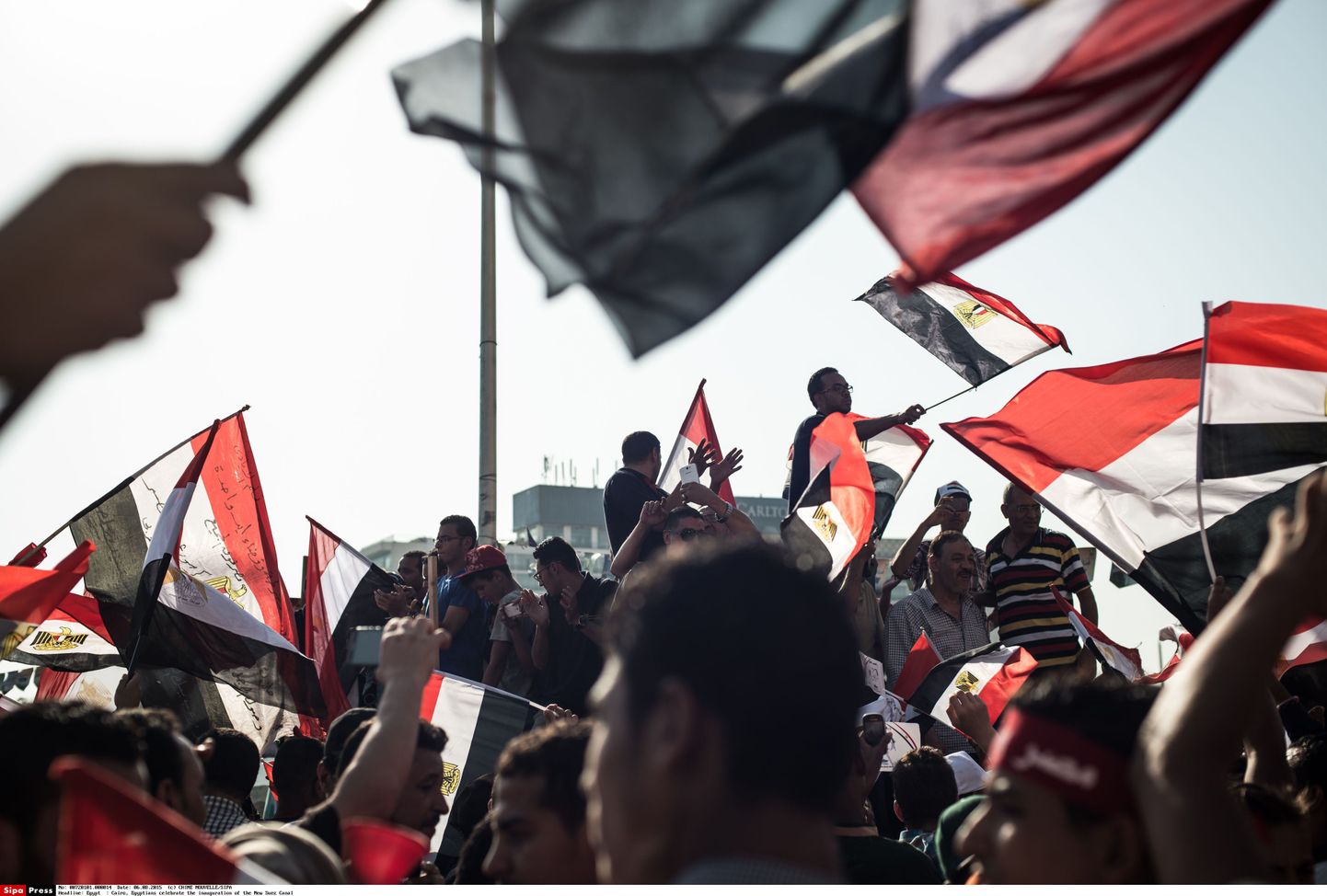 Egiptuse elanikud riigilippudega
