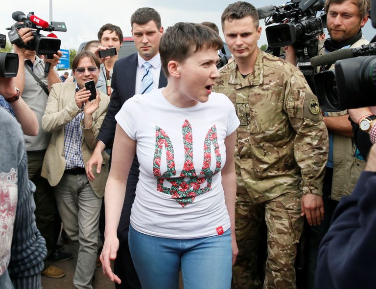 Ukrainian servicewoman Nadiya Savchenko reacts at Boryspil International airport outside Kiev, Ukraine, May 25, 2016. REUTERS/Gleb Garanich