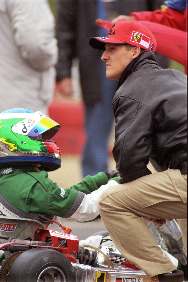 Retrofoto: Michael Schumacher 1998. aastal Sebastian Vettelile nõu andmas /imago/Herbert Bucco