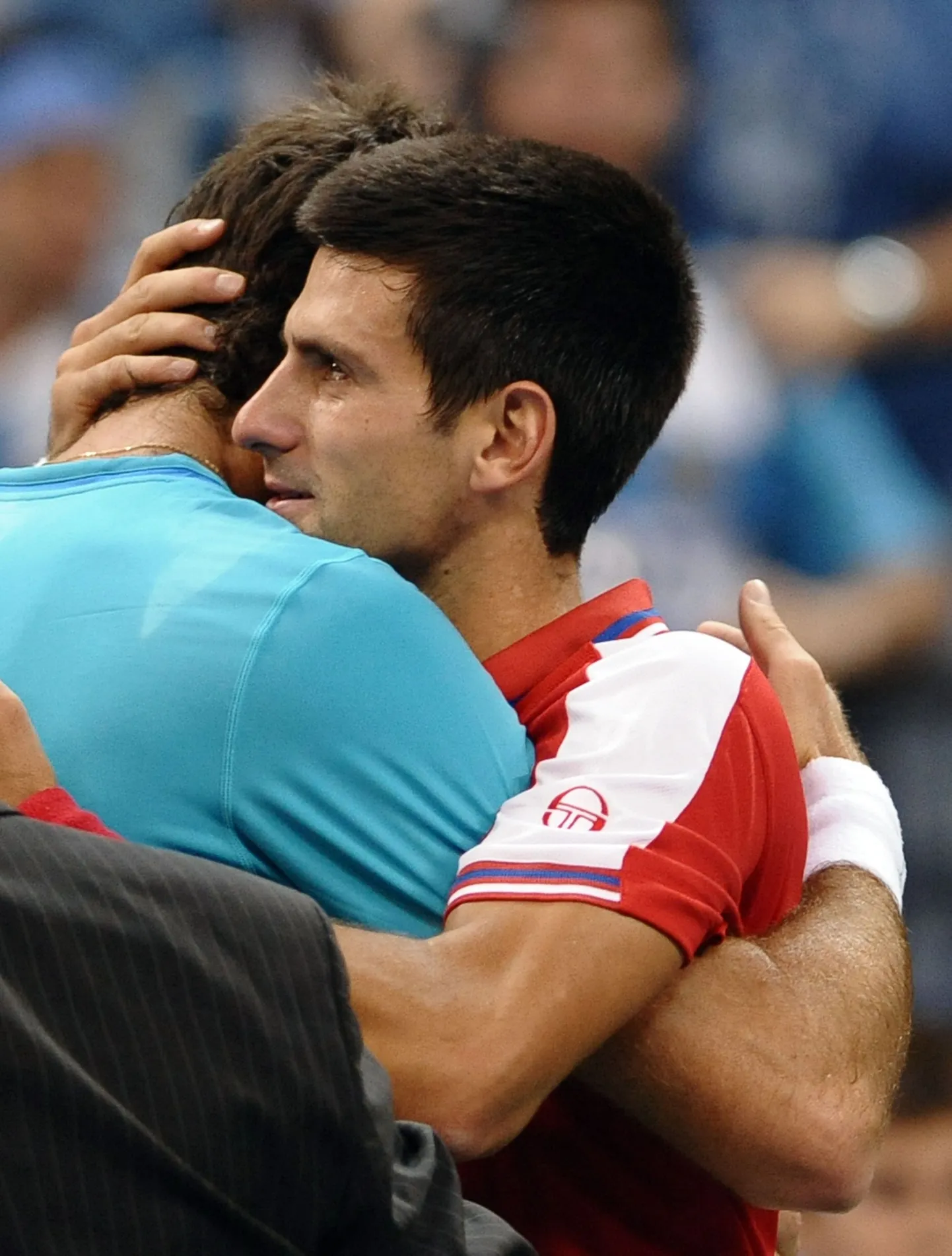 Pisarais Novak Djokovic embab Juan Martin Del Potrot. Djokovic oli sunnitud vigastuse tõttu mängu pooleli jätma.