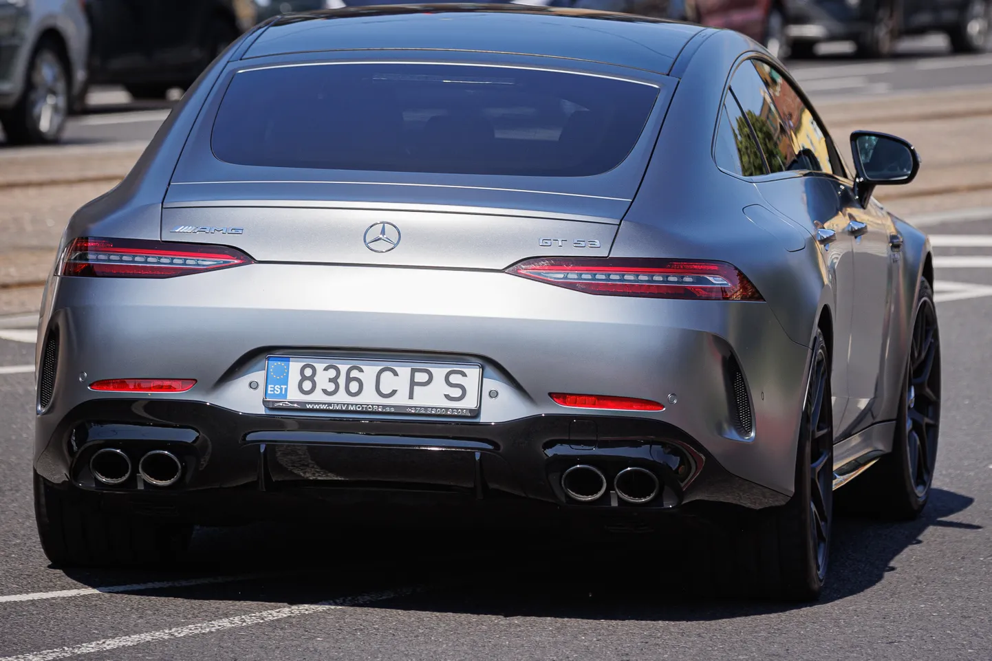 Рамка номерного знака с рекламой JMV Motors на Mercedes-Benz AMG GT 53.