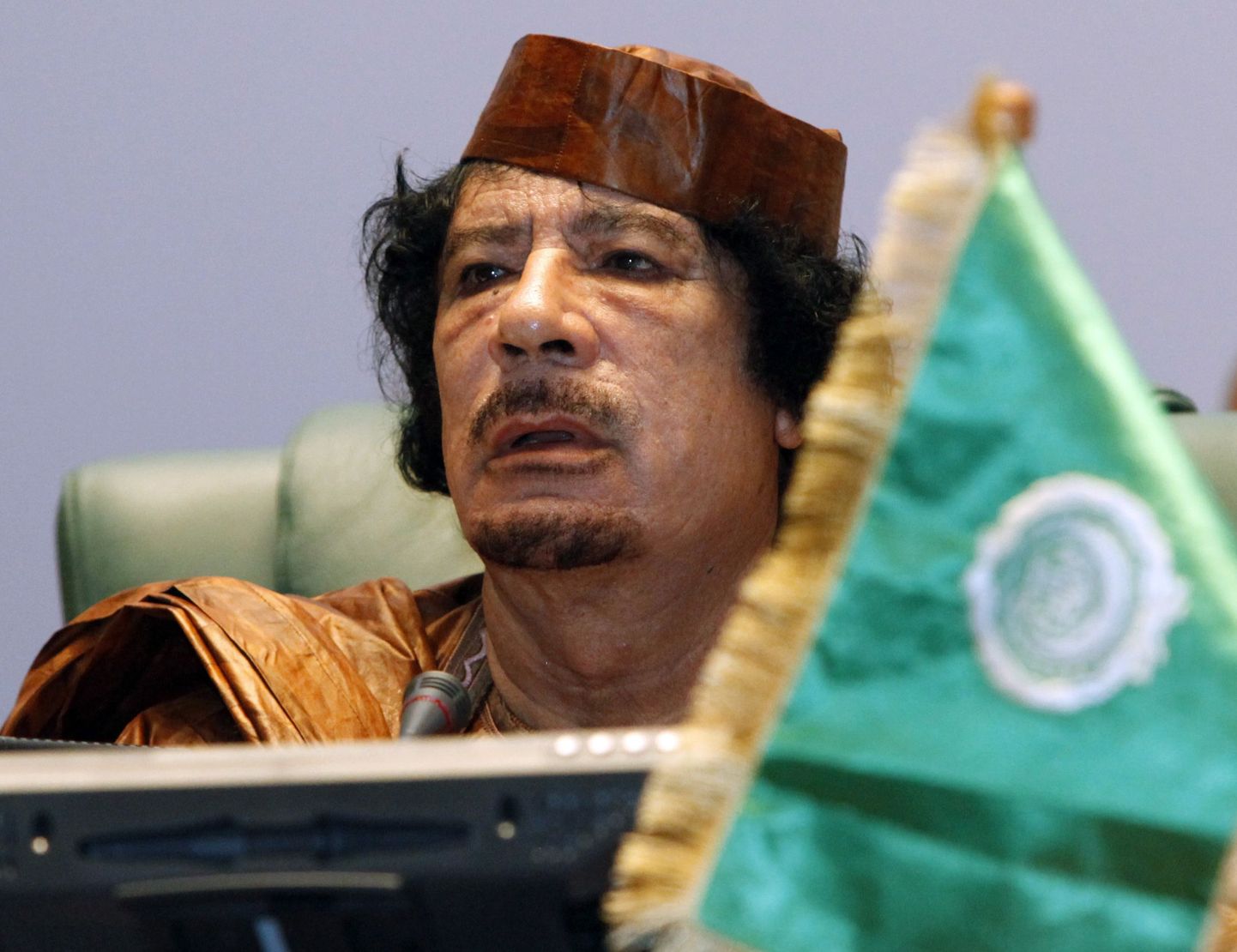 Muammar al-Gaddafi.