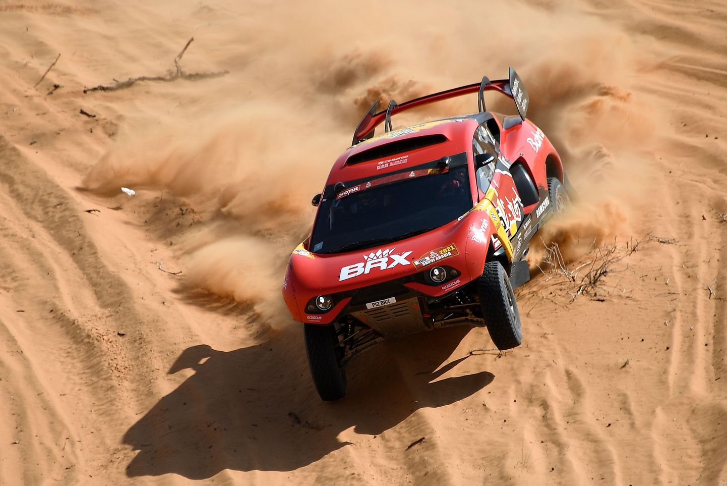 French driver Sebastien Loeb and co-driver Daniel Elena of Monaco compete during the 6th Stage of the Dakar Rally 2021 between Buraydah and Hail, in Saudi Arabia, on January 8, 2021. (Photo by FRANCK FIFE / AFP)
