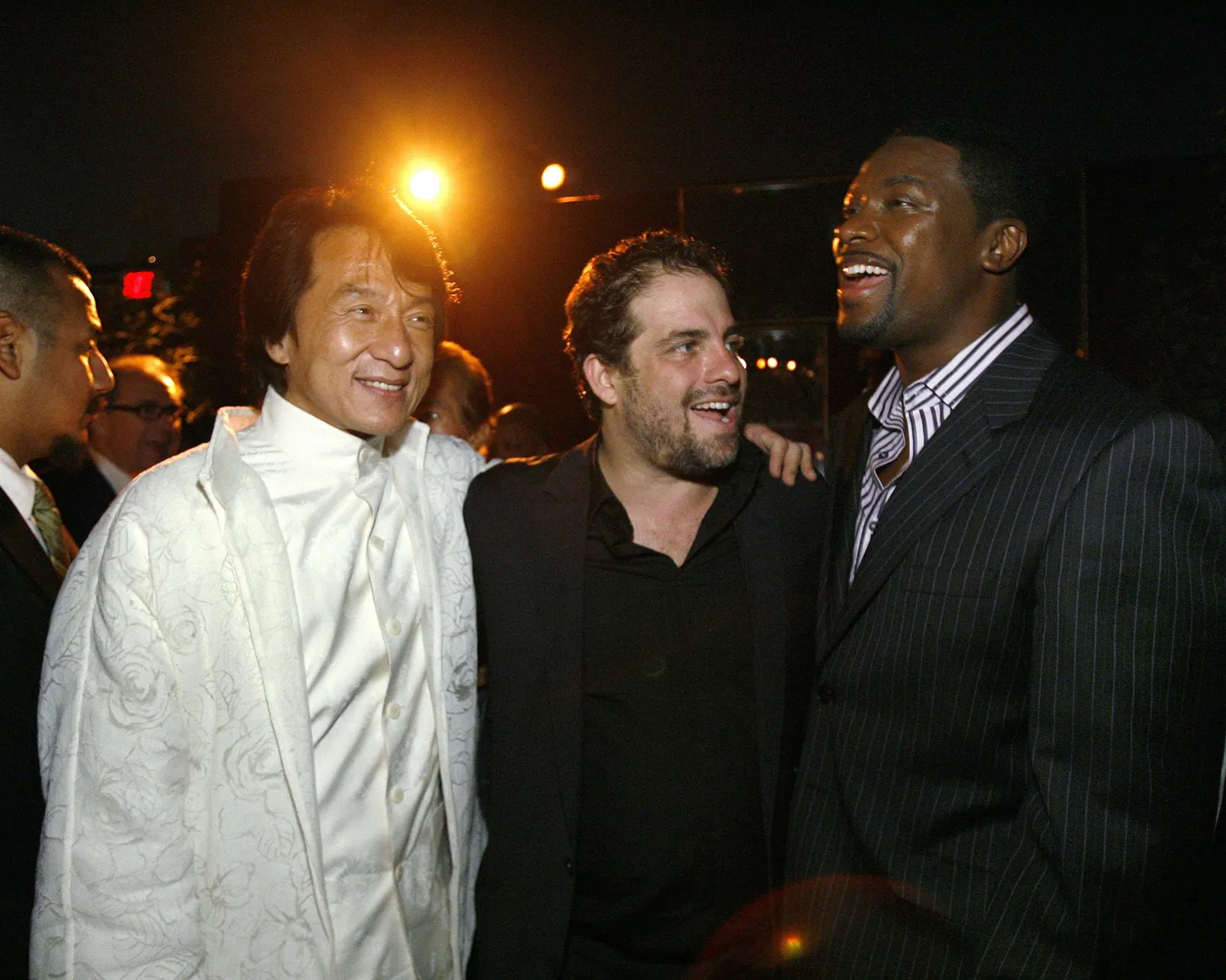 Brett Ratner (keskel) koos Jackie Chani (vasakul) ja Chris Tuckeriga