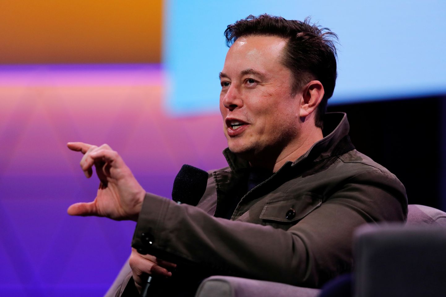 FILE PHOTO: SpaceX owner and Tesla CEO Elon Musk gestures during a conversation with legendary game designer Todd Howard (not pictured) at the E3 gaming convention in Los Angeles, California, U.S., June 13, 2019.  REUTERS/Mike Blake/File Photo
