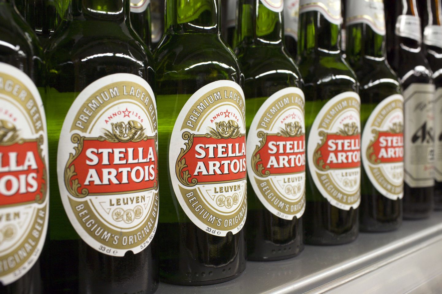 Bottles of Stella Artois beer, a brand of InBev, are displayed for sale at a store in Hong Kong's Sheung Wan district June 12, 2008. InBev NV has offered to buy Anheuser-Busch Cos Inc for $46.3 billion, as it seeks to create the world's largest brewer with the biggest ever takeover of an alcoholic drinks company. InBev, whose brands include Stella Artois and Beck's, said on Wednesday it is offering $65 per share for Anheuser, which dominates the U.S. beer market with a 48.5 percent share.   REUTERS/Victor Fraile (CHINA)
