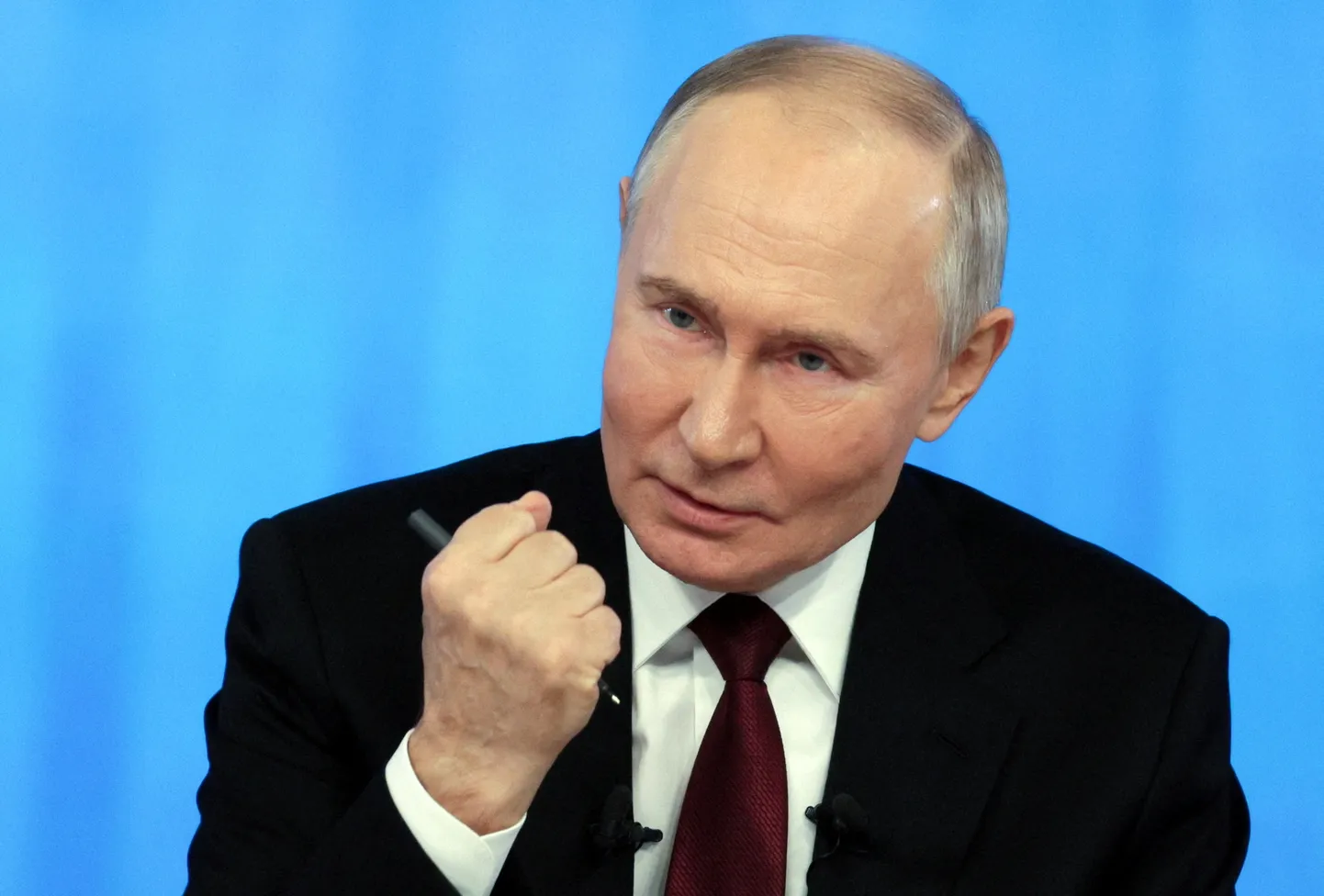 War criminal Vladimir Putin.