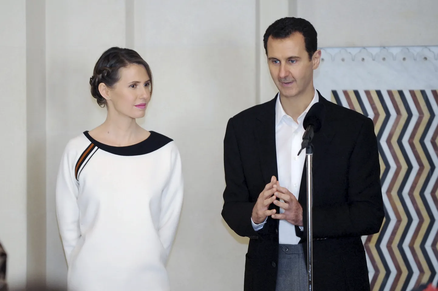 Süüria nüüdseks kukutatud president Bashar al-Assad ja ta naine Asma al-Assad 21. märtsil 2016 Damaskuses Süüria emadepäeva sündmusel