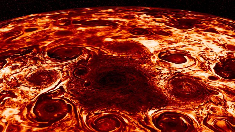 Infrapunapilt Jupiteri põhjapoolusel möllavatest kummalise asetusega tormidest