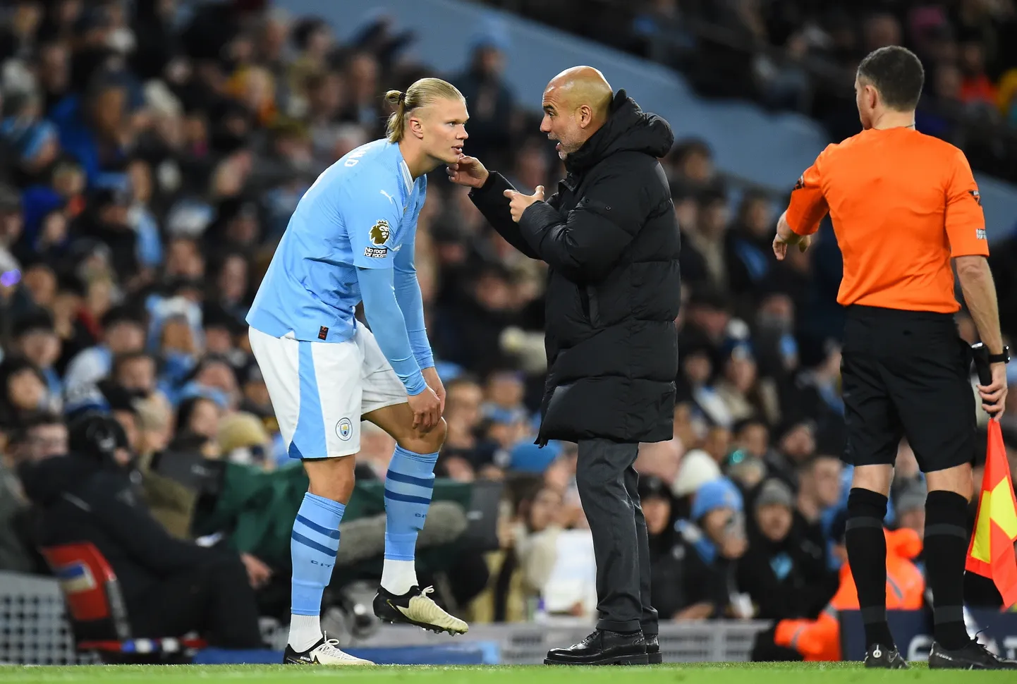 Erling Haaland (vasakul) ja Pep Guardiola.
