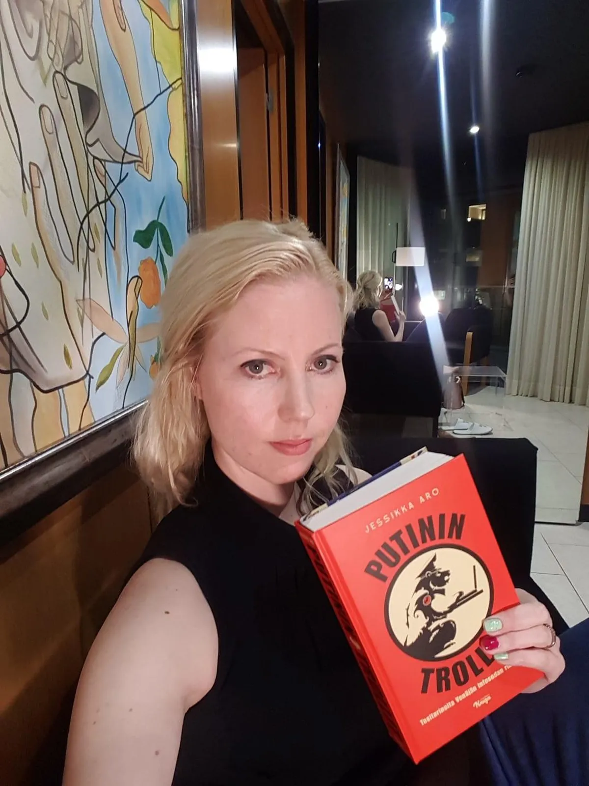 Jessikka Aro with her book Putin’s Trolls.