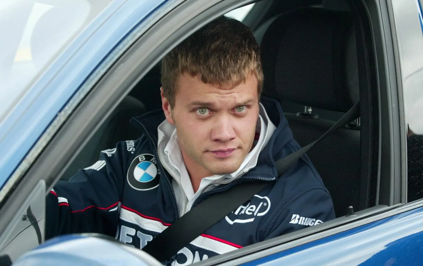 Marko Asmer 2008. aasta sügisel Raadi lennuväljal BMW roolis.