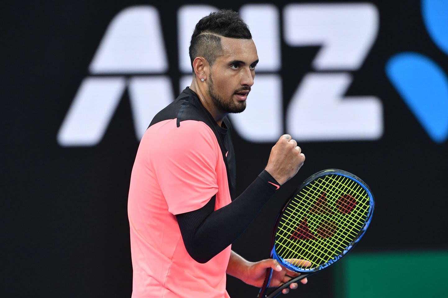Australia's Nick Kyrgios reacts during their men's singles first round match against Brazil's Rogerio Dutra Silva on day one of the Australian Open tennis tournament in Melbourne on January 15, 2018. / AFP PHOTO / SAEED KHAN / -- IMAGE RESTRICTED TO EDITORIAL USE - STRICTLY NO COMMERCIAL USE --