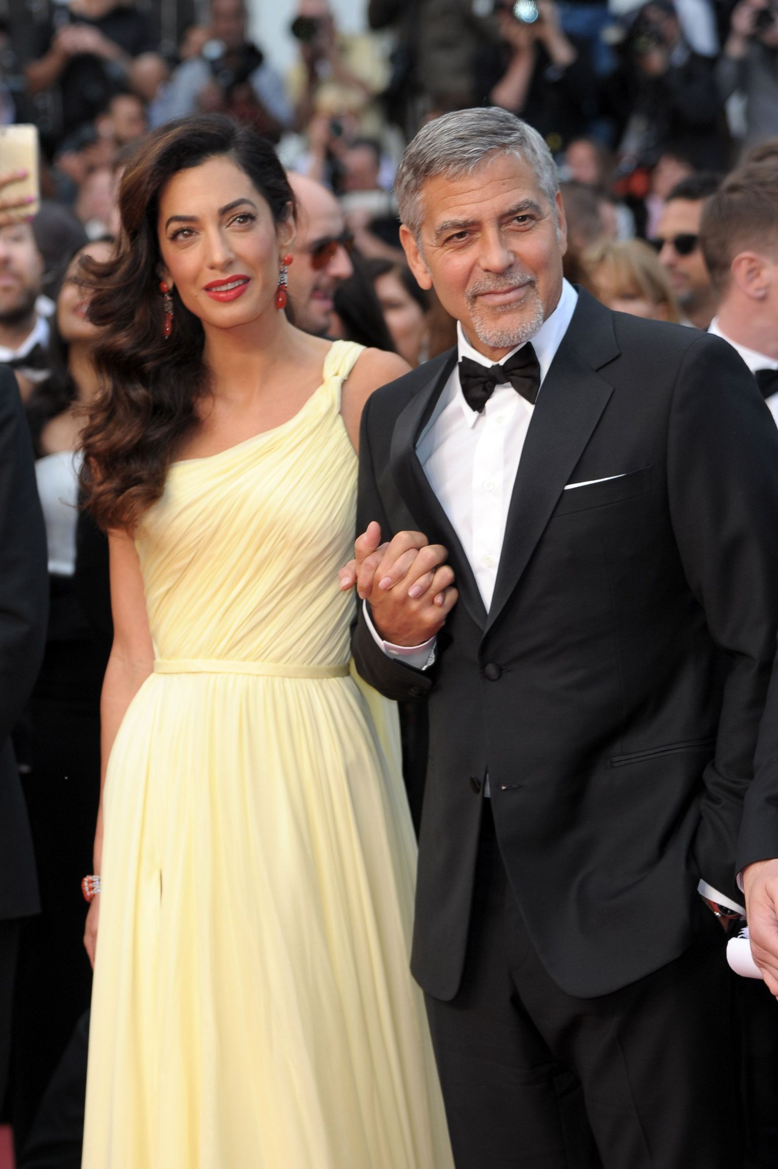 George ja Amal Clooney Cannes´is punasel vaibal