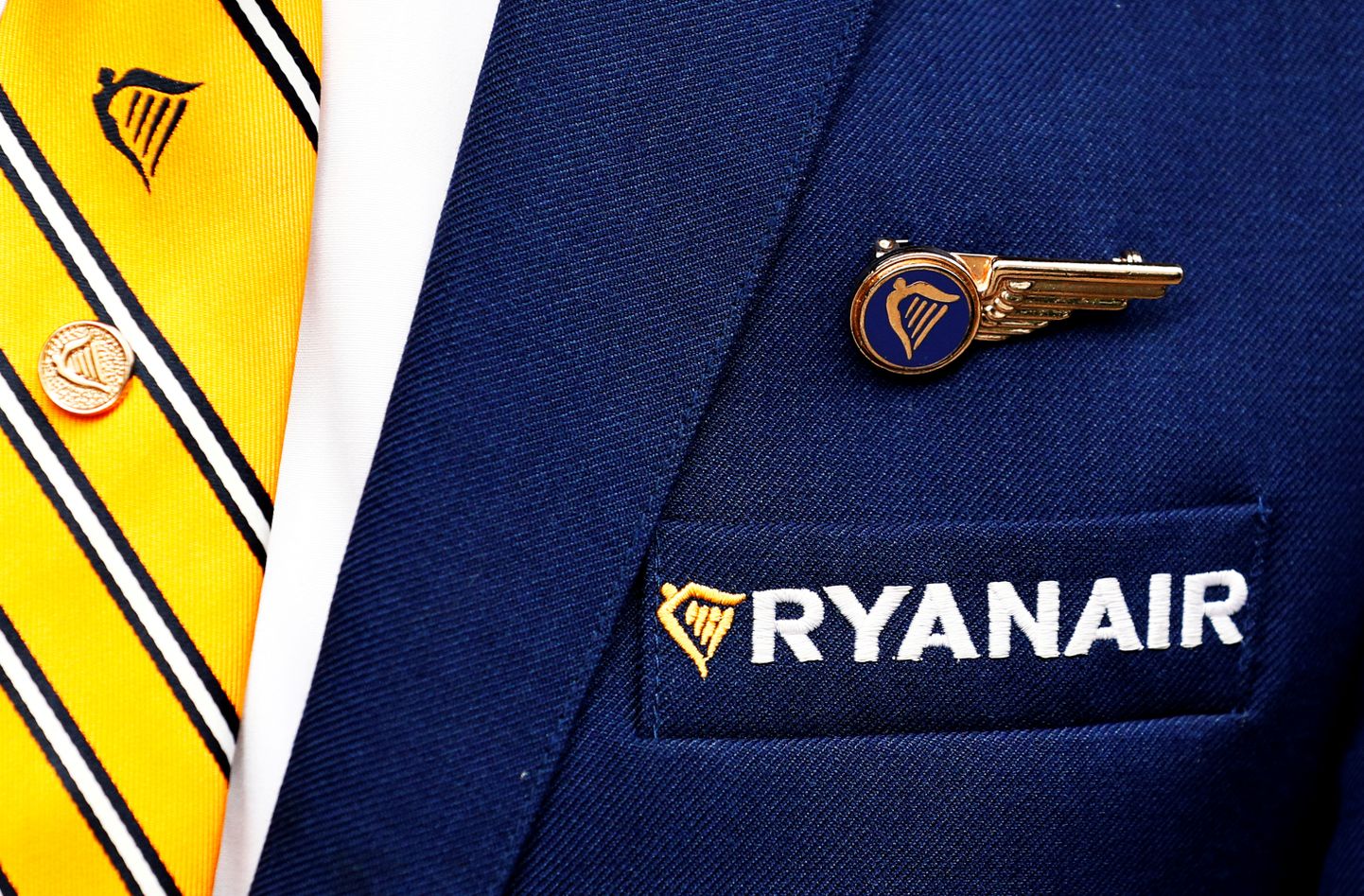 FILE PHOTO: Ryanair logo is pictured on the the jacket of a cabin crew member ahead of a news conference by Ryanair union representatives in Brussels, Belgium September 13, 2018.   REUTERS/Francois Lenoir/File Photo